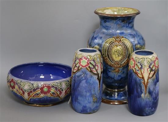 A Royal Doulton vase decorated with profile portrait plaques and urns and a pair of ovoid vases and bowl en suite height 30cm (largest)